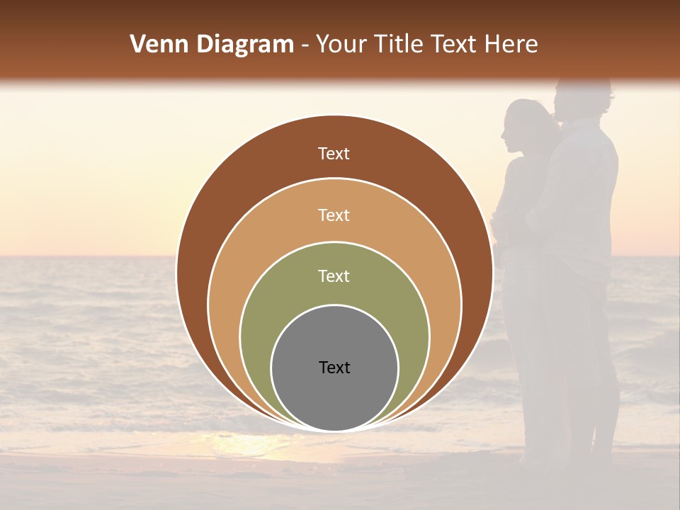 Two People Standing On A Beach At Sunset PowerPoint Template
