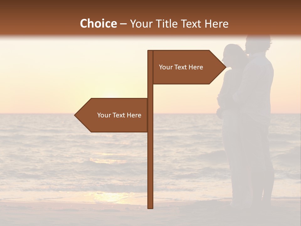Two People Standing On A Beach At Sunset PowerPoint Template