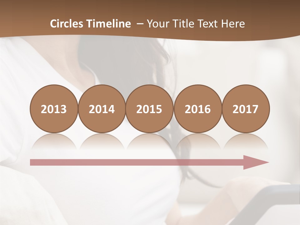 A Woman Sitting On A Couch Holding A Cell Phone PowerPoint Template