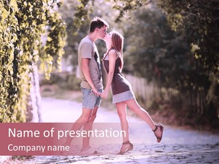 A Man And A Woman Walking Down A Street Holding Hands PowerPoint Template