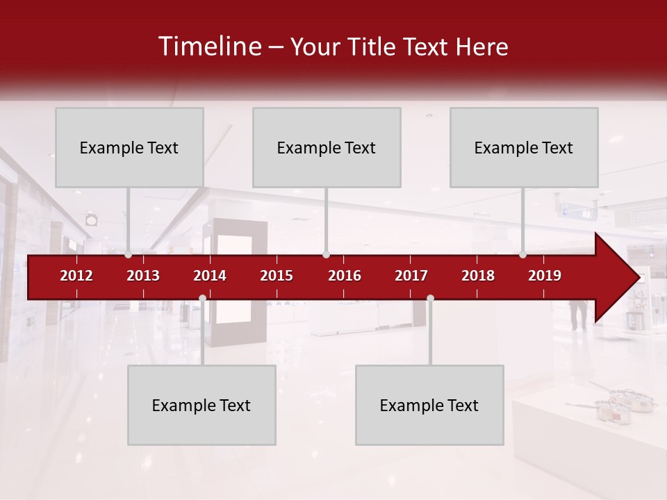 A Person Standing In A Large White Room PowerPoint Template