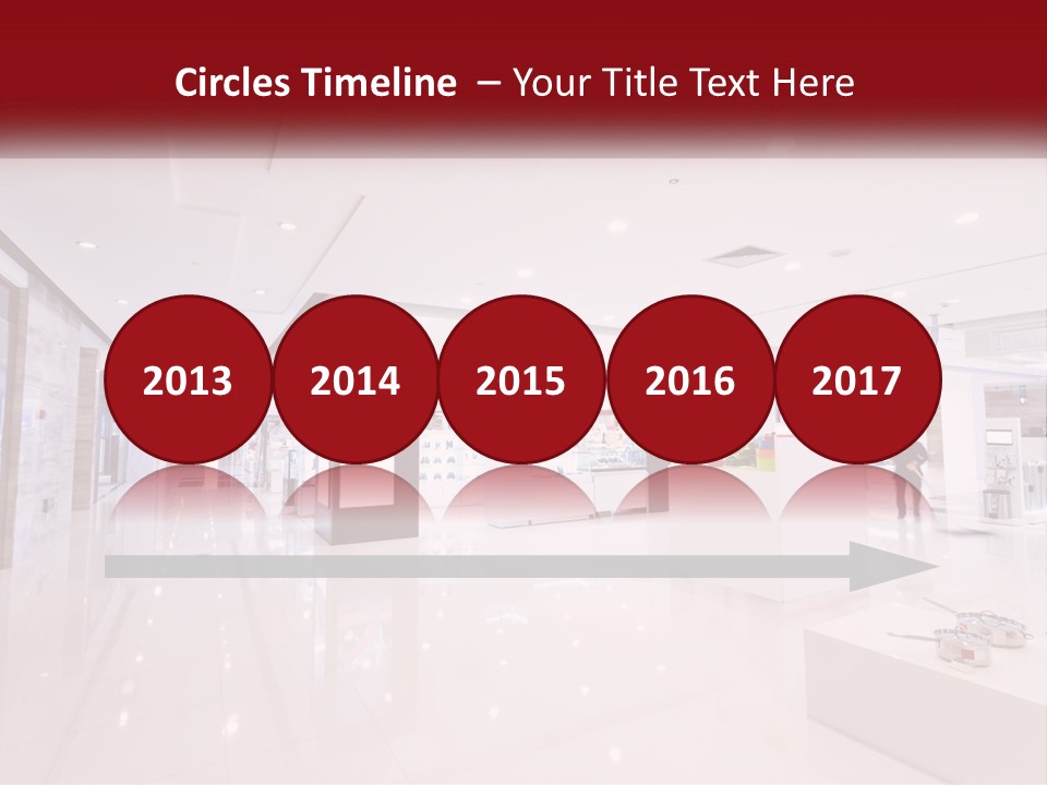 A Person Standing In A Large White Room PowerPoint Template