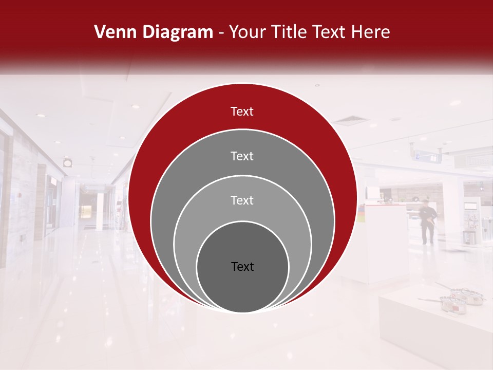 A Person Standing In A Large White Room PowerPoint Template