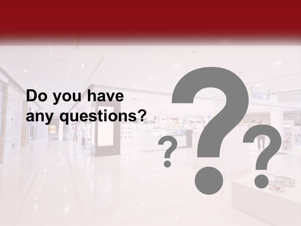 A Person Standing In A Large White Room PowerPoint Template