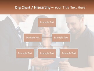 A Man And A Woman Looking At A Tablet PowerPoint Template