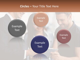 A Man And A Woman Looking At A Tablet PowerPoint Template