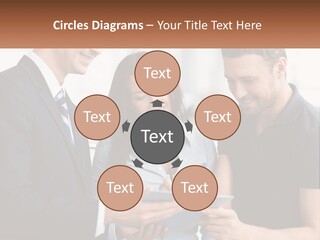 A Man And A Woman Looking At A Tablet PowerPoint Template