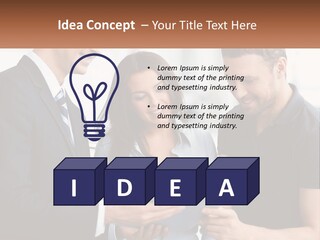 A Man And A Woman Looking At A Tablet PowerPoint Template