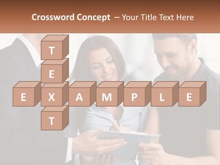 A Man And A Woman Looking At A Tablet PowerPoint Template