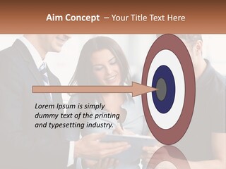 A Man And A Woman Looking At A Tablet PowerPoint Template