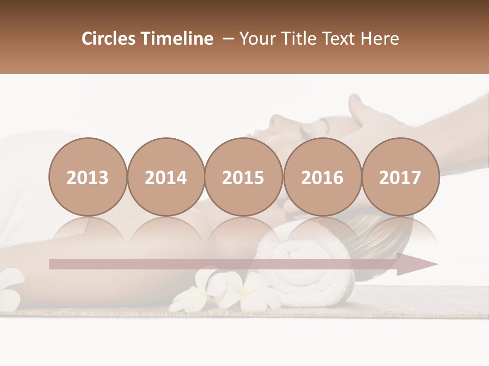 A Woman Getting A Facial Massage With A Towel On Her Head PowerPoint Template