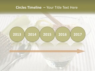 A Bowl Of Food With A Lime On Top Of It PowerPoint Template