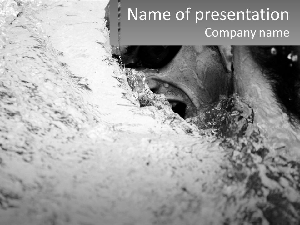 A Black And White Photo Of A Man In The Water PowerPoint Template