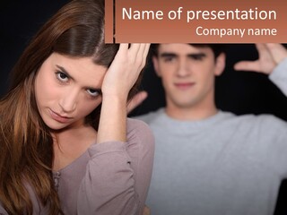 A Woman Holding A Sign With A Man Behind Her PowerPoint Template