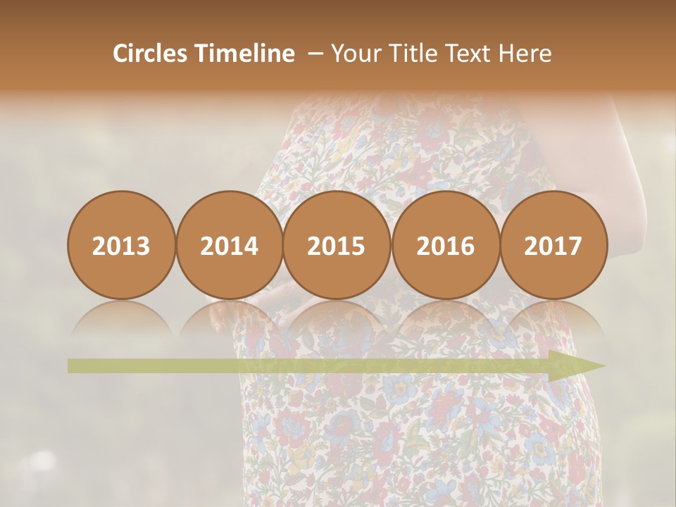 A Pregnant Woman In A Colorful Dress Is Holding Her Belly PowerPoint Template