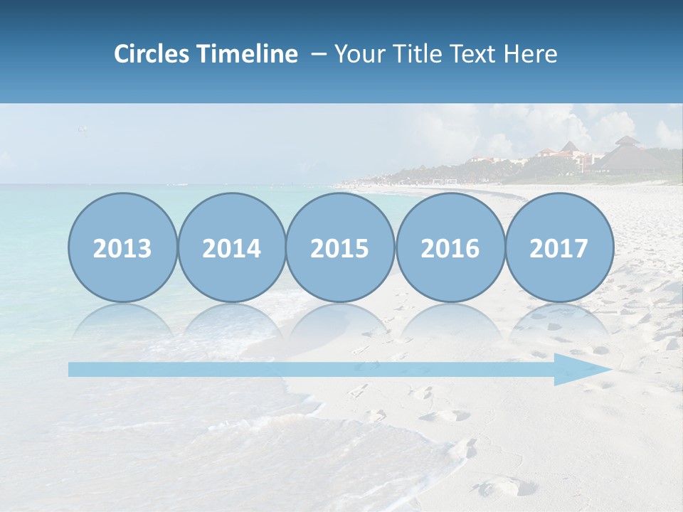 A Sandy Beach With Footprints In The Sand PowerPoint Template