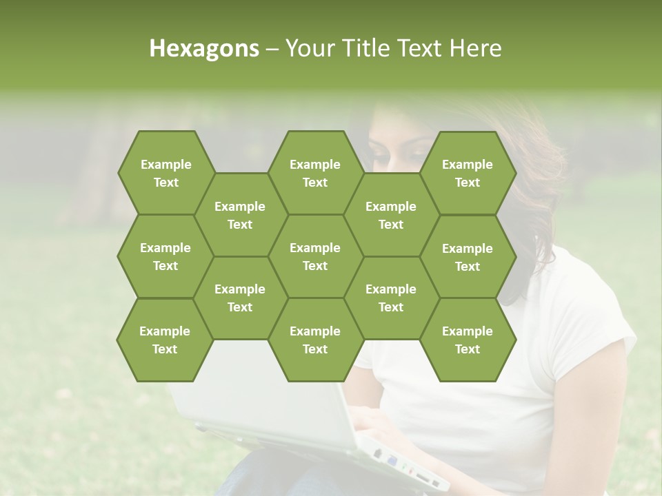 A Woman Sitting In The Grass Using A Laptop Computer PowerPoint Template