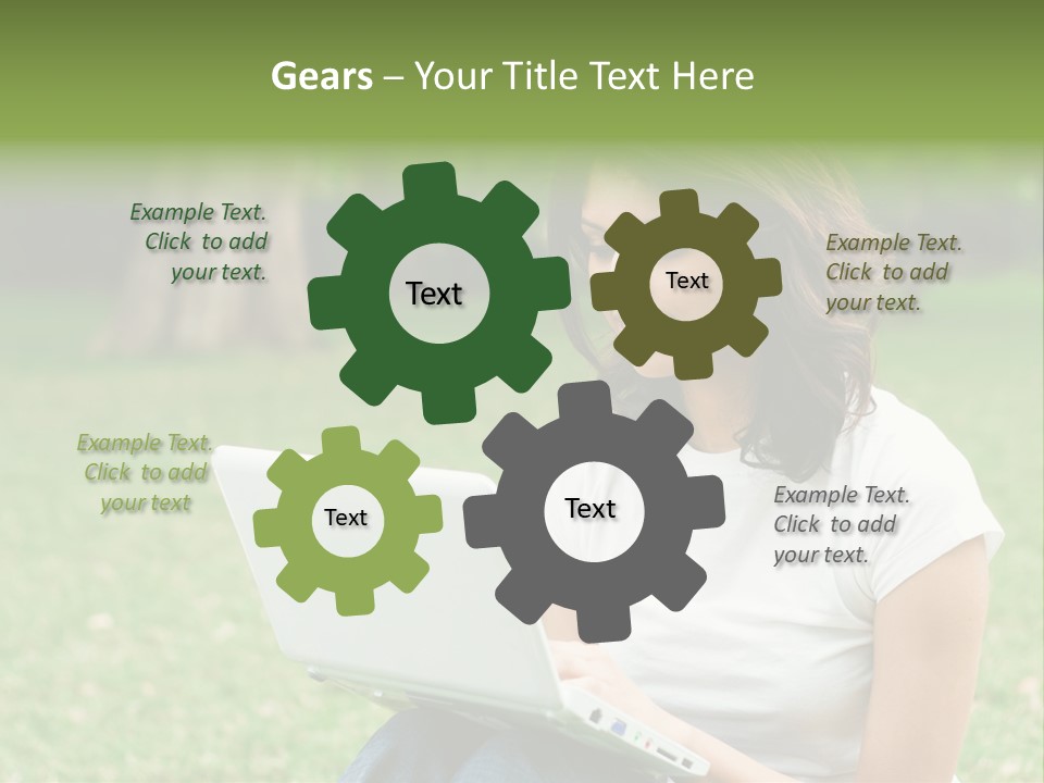 A Woman Sitting In The Grass Using A Laptop Computer PowerPoint Template