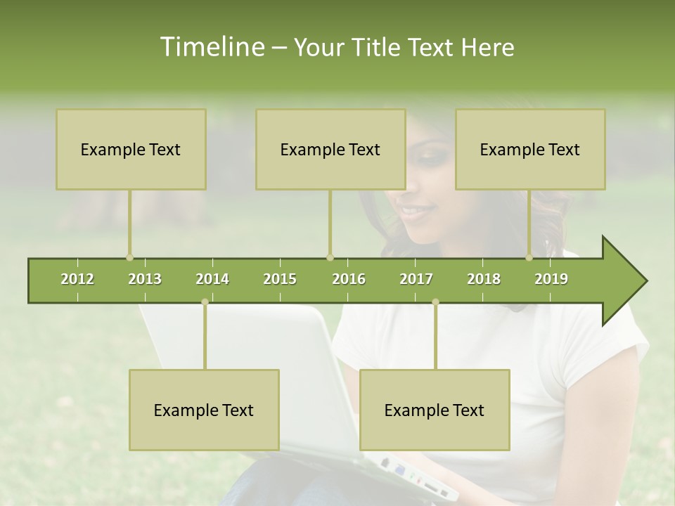 A Woman Sitting In The Grass Using A Laptop Computer PowerPoint Template