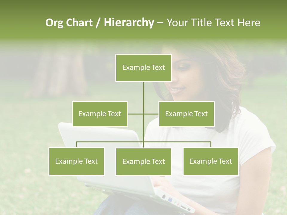 A Woman Sitting In The Grass Using A Laptop Computer PowerPoint Template