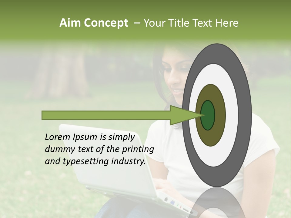 A Woman Sitting In The Grass Using A Laptop Computer PowerPoint Template