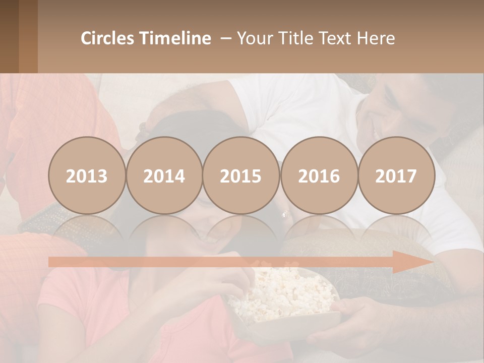 A Man And Woman Sitting On A Couch Eating Popcorn PowerPoint Template