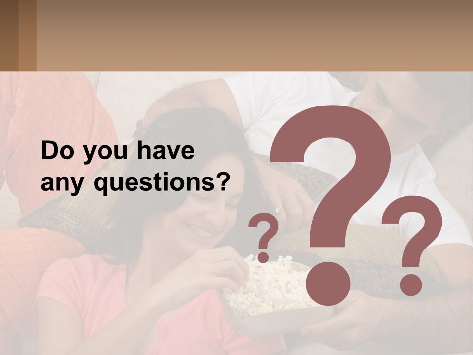 A Man And Woman Sitting On A Couch Eating Popcorn PowerPoint Template