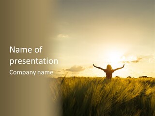 A Person Standing In A Field With Their Arms Outstretched PowerPoint Template