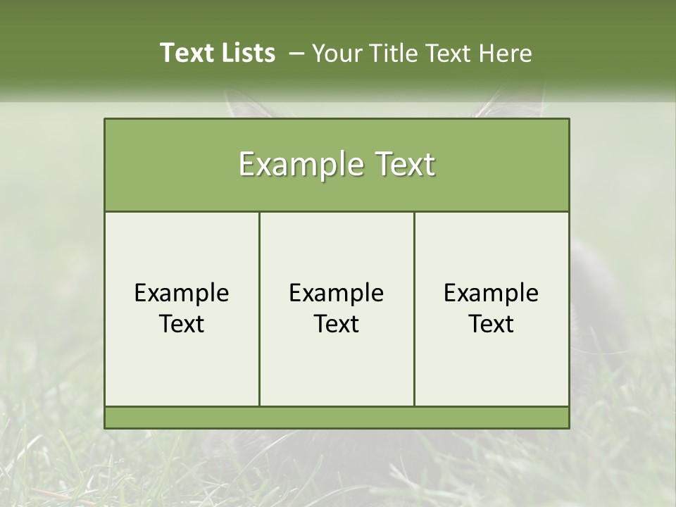 A Cat Laying In The Grass Looking At The Camera PowerPoint Template