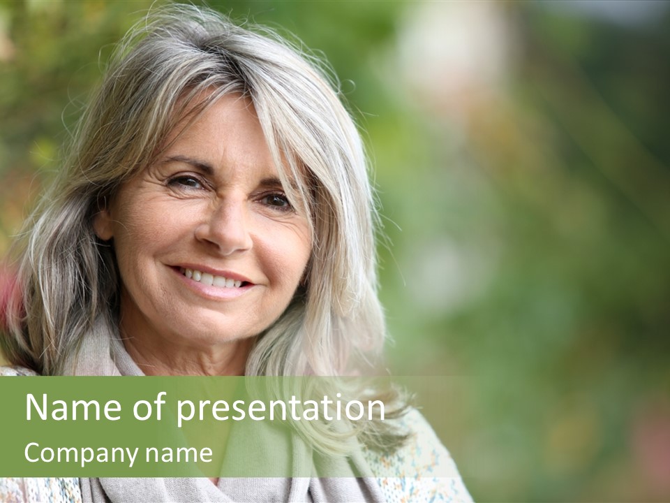 A Woman With Gray Hair Is Smiling For The Camera PowerPoint Template