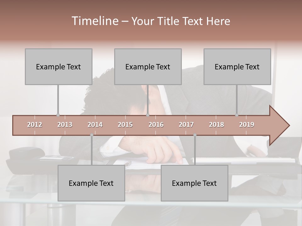 A Man In A Suit Sleeping On A Desk PowerPoint Template