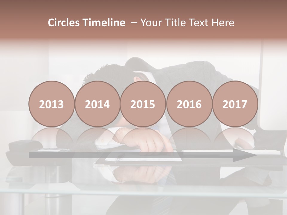 A Man In A Suit Sleeping On A Desk PowerPoint Template