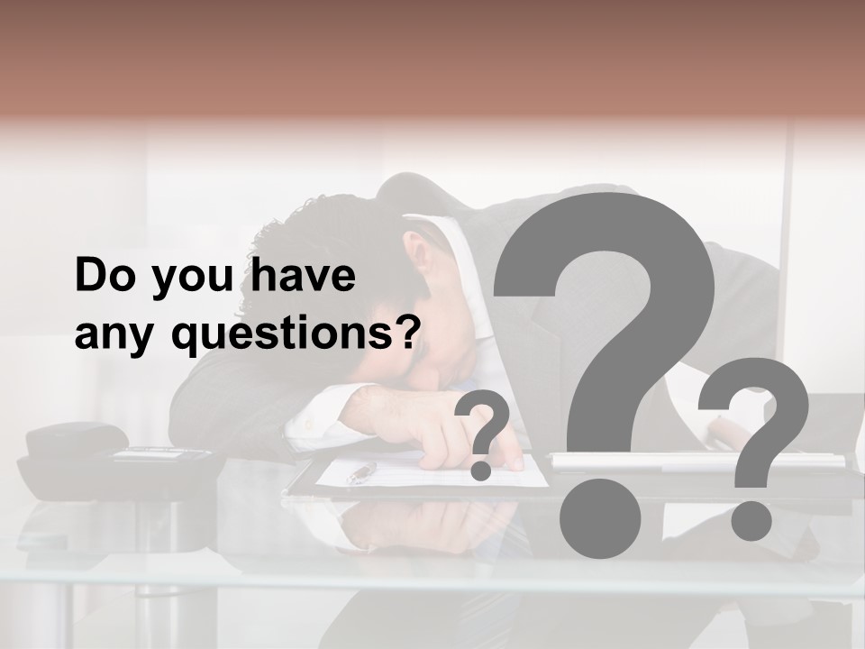 A Man In A Suit Sleeping On A Desk PowerPoint Template