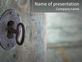 A Metal Door With A Key On It PowerPoint Template