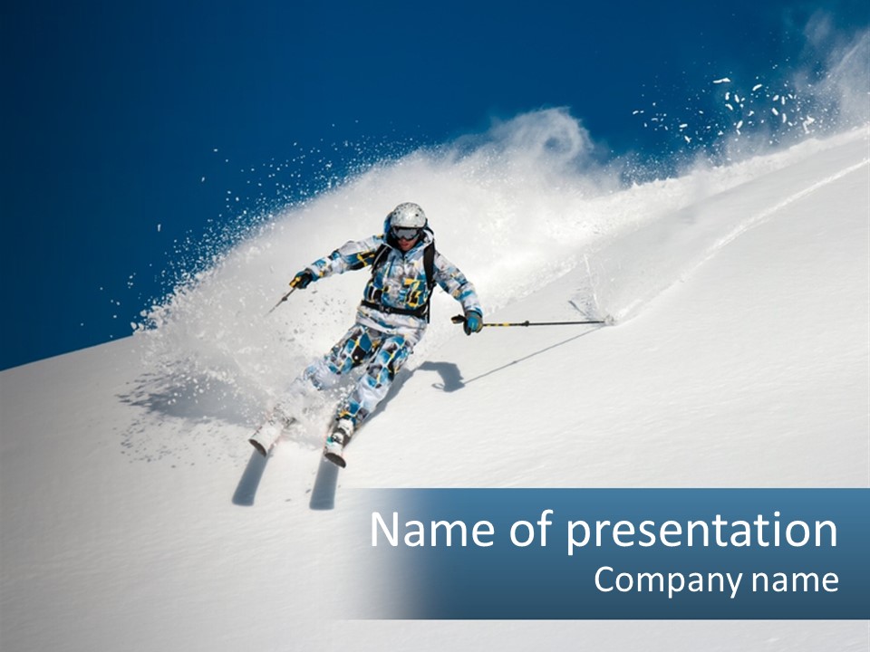 A Person Skiing Down A Snow Covered Slope PowerPoint Template