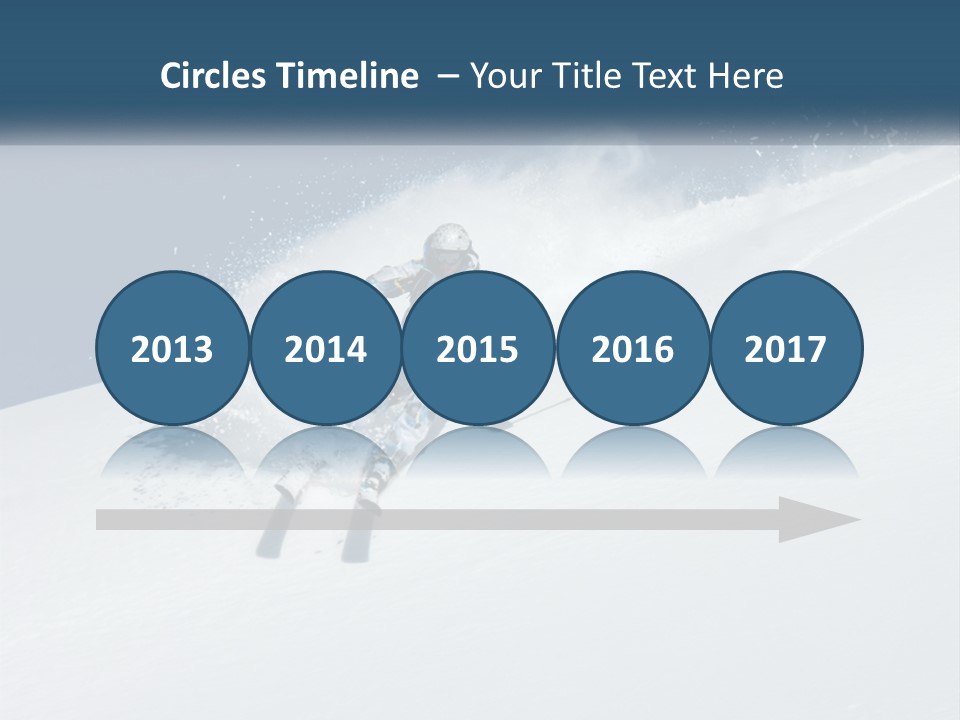 A Person Skiing Down A Snow Covered Slope PowerPoint Template