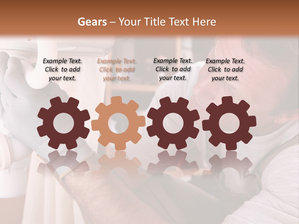 A Man Working On A Pipe In A Kitchen PowerPoint Template