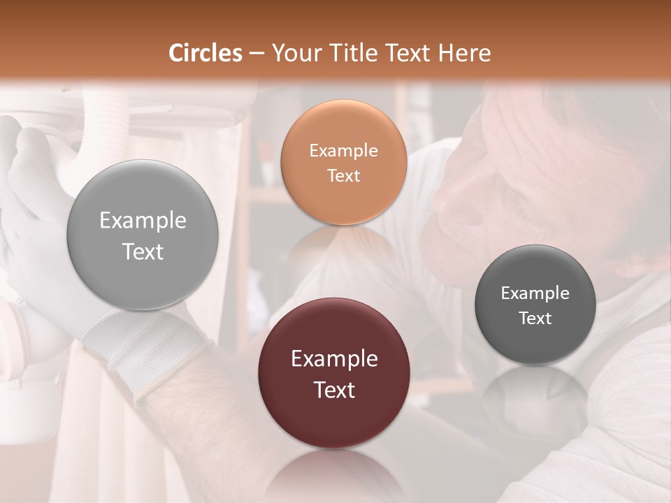 A Man Working On A Pipe In A Kitchen PowerPoint Template