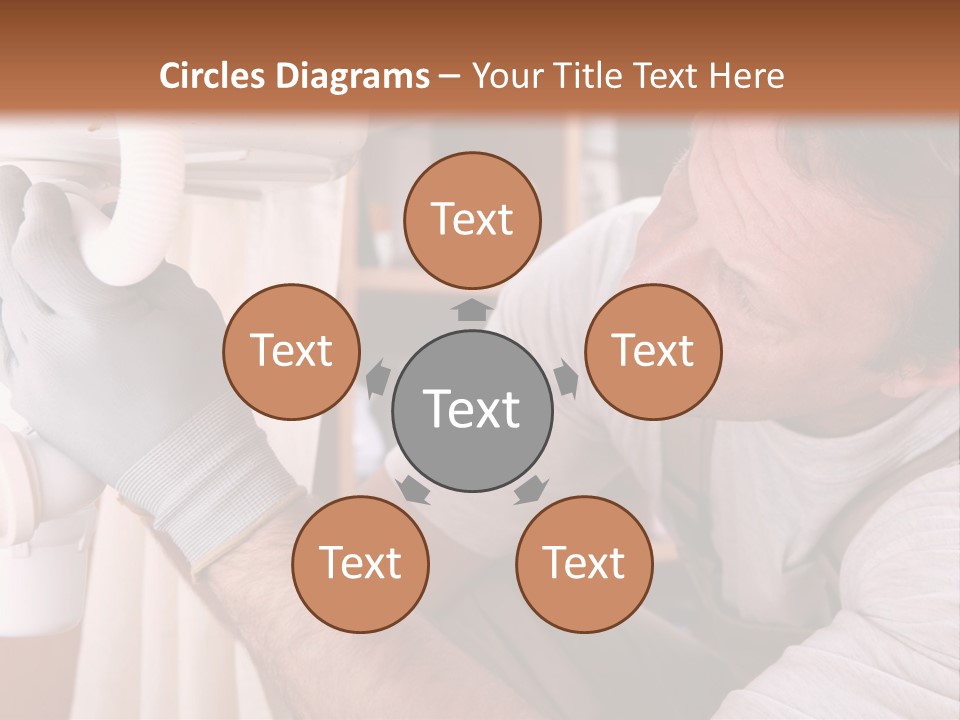 A Man Working On A Pipe In A Kitchen PowerPoint Template