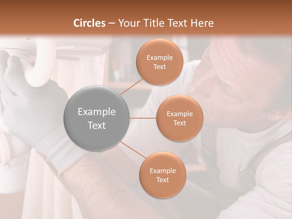 A Man Working On A Pipe In A Kitchen PowerPoint Template