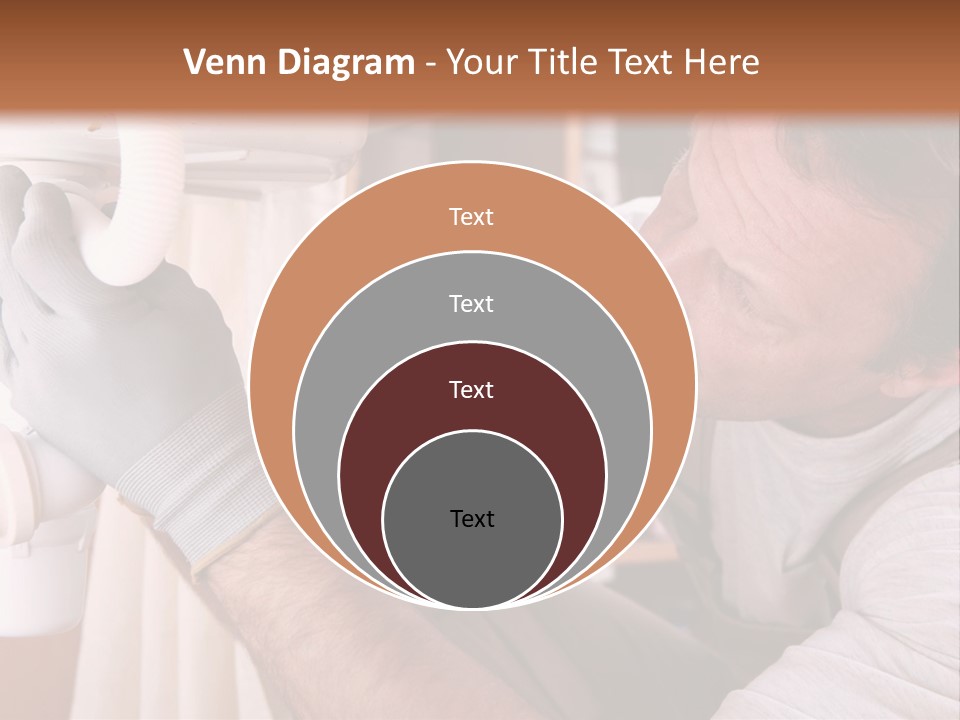 A Man Working On A Pipe In A Kitchen PowerPoint Template