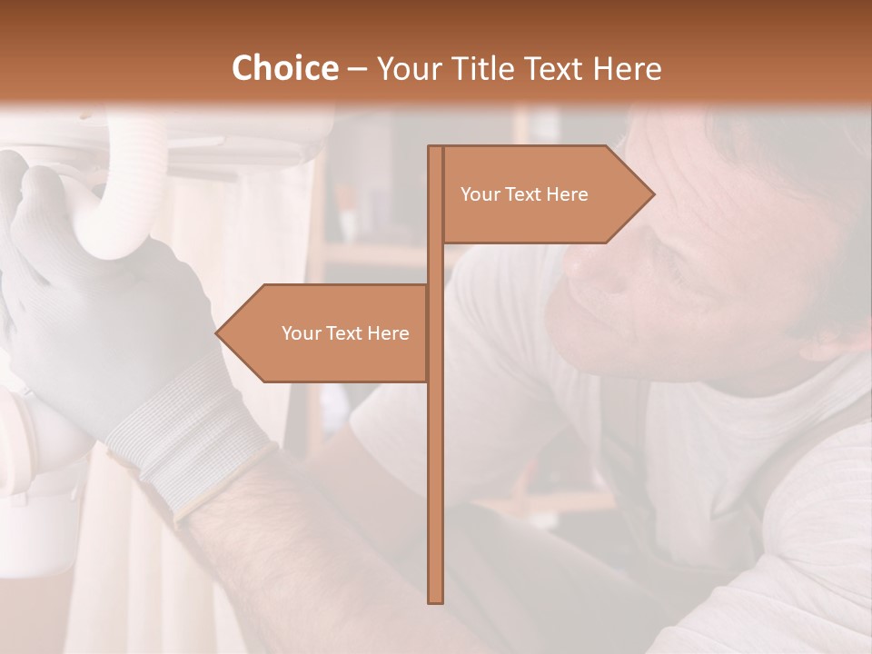 A Man Working On A Pipe In A Kitchen PowerPoint Template