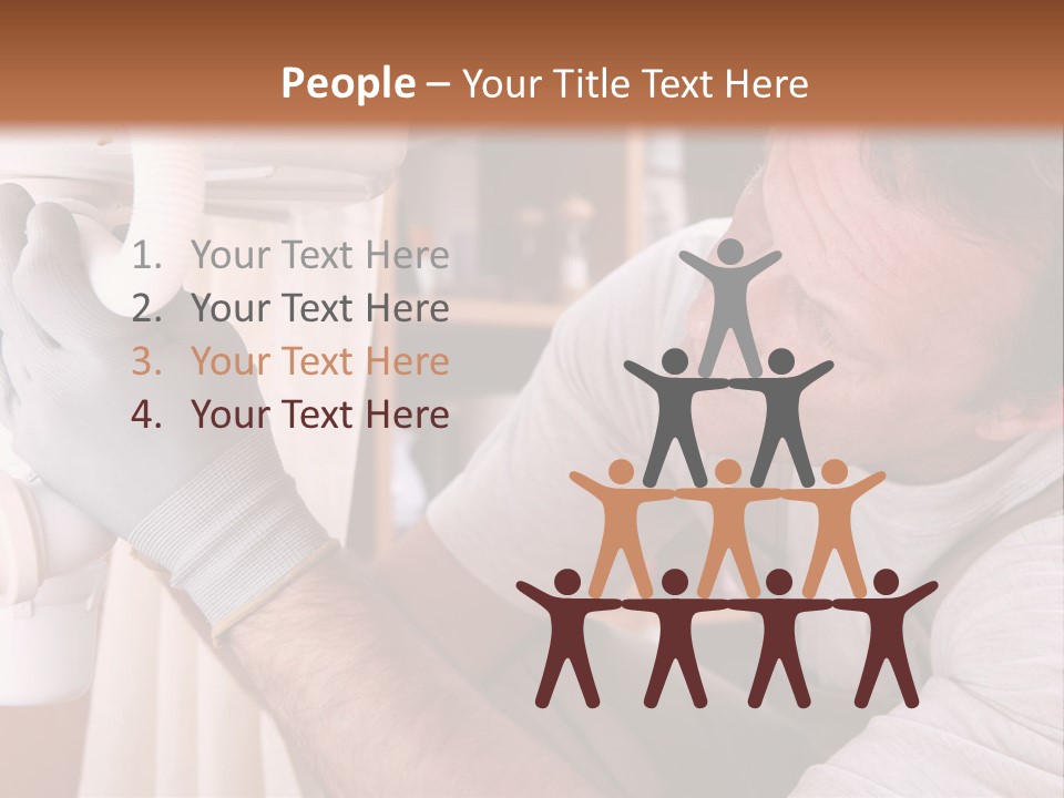 A Man Working On A Pipe In A Kitchen PowerPoint Template