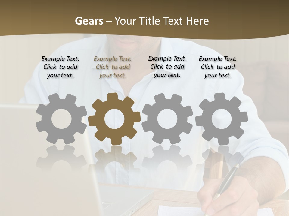 A Man Sitting At A Desk Writing On A Piece Of Paper PowerPoint Template