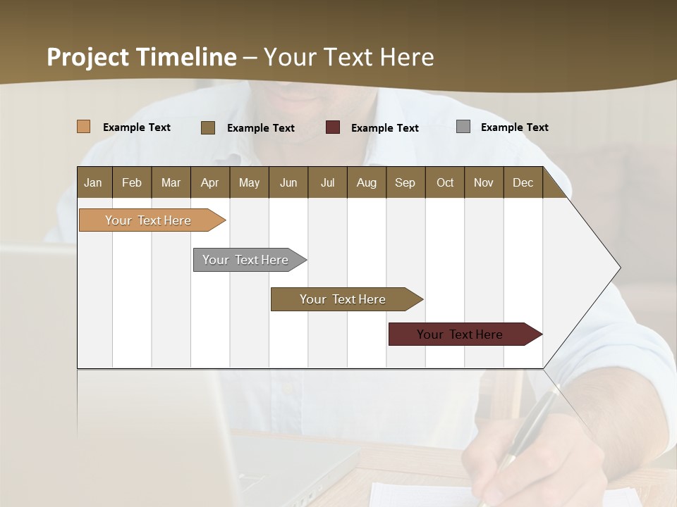 A Man Sitting At A Desk Writing On A Piece Of Paper PowerPoint Template