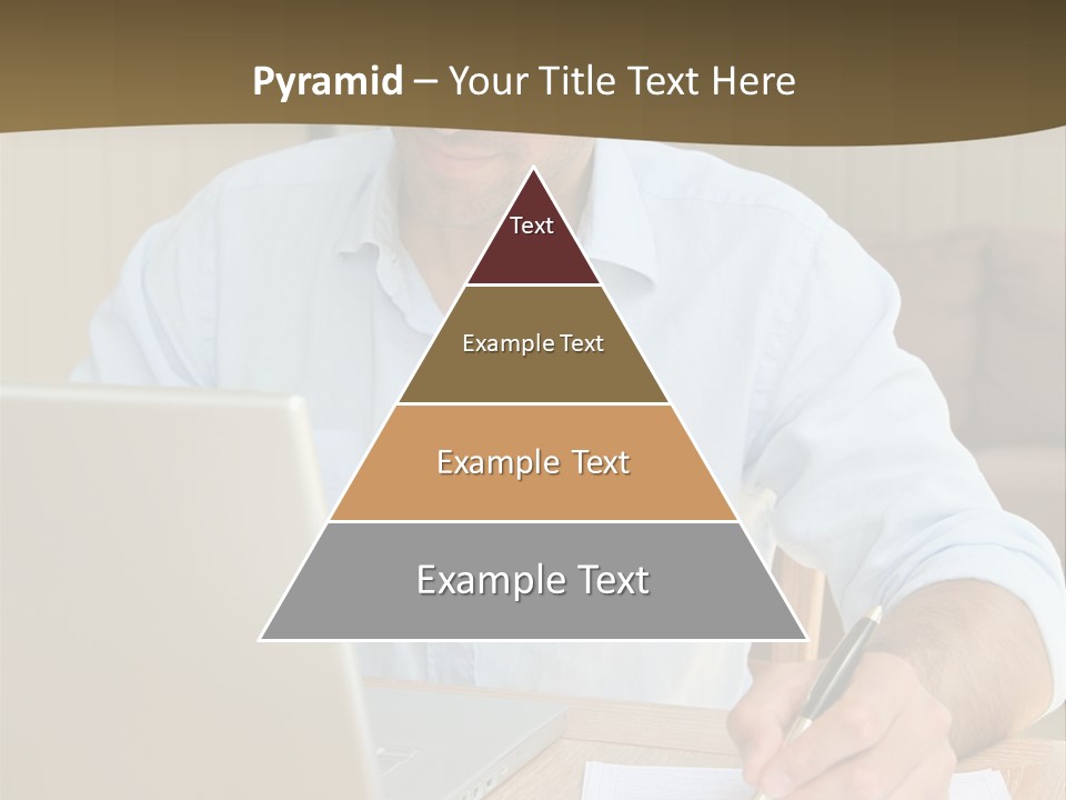A Man Sitting At A Desk Writing On A Piece Of Paper PowerPoint Template