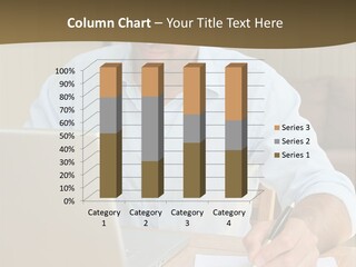 A Man Sitting At A Desk Writing On A Piece Of Paper PowerPoint Template