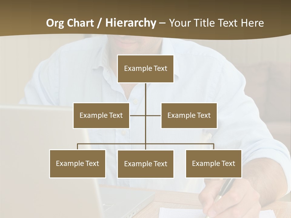 A Man Sitting At A Desk Writing On A Piece Of Paper PowerPoint Template