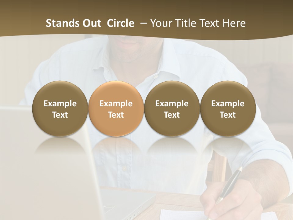 A Man Sitting At A Desk Writing On A Piece Of Paper PowerPoint Template