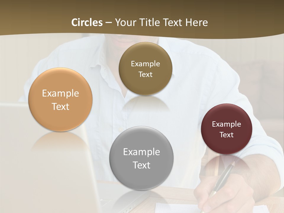 A Man Sitting At A Desk Writing On A Piece Of Paper PowerPoint Template